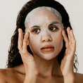 Load image into Gallery viewer, Woman wearing Luminouss Hydration Rescue Sheet Mask – Best Moisturizing Face Mask for Dry & Dehydrated Skin | Infused with Jackfruit, Coconut Water & Ginger
